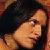 Sara, Taker's wife.