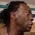 Booker T looking to the right.