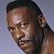 Booker with short hair in WCW.