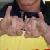 John Cena doing the 'double horns'.