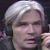 Eric wearing a headset at the announcers' table.