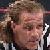 HBK in a ref shirt, looking not too happy.
