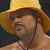 Scotty wearing a yellow bucket hat.