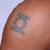 Shane's Green Lantern tattoo on his shoulder.